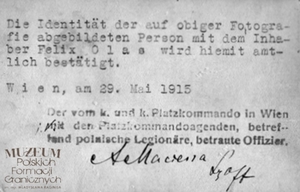1. Tytuł: identyfikator legionowy 
2. Opis obrazu: zdjęcie Feliksa Olasa potwierdzone na odwrocie  przez Komendę Placu w Wiedniu
3. Data wydarzenia: 29.05.1915 r.
4. Osoby widoczne: Feliks Olas
5. Hasła przedmiotowe: kadra
6. Opis techniczny: oryginał, czarnobiałe
7. Autor: Rudolf Neffe
8. Miejsce przechowywania/właściciel: Andrzej Olas
